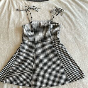 Gingham mini dress with spaghetti strap bow sleeves